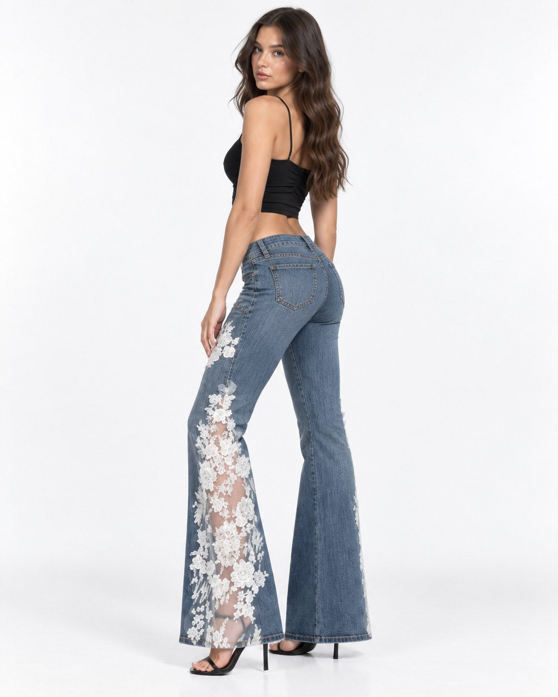 Ivory Bloom Flare Jeans angled on model