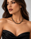 The Serpent Necklace worn with a black top