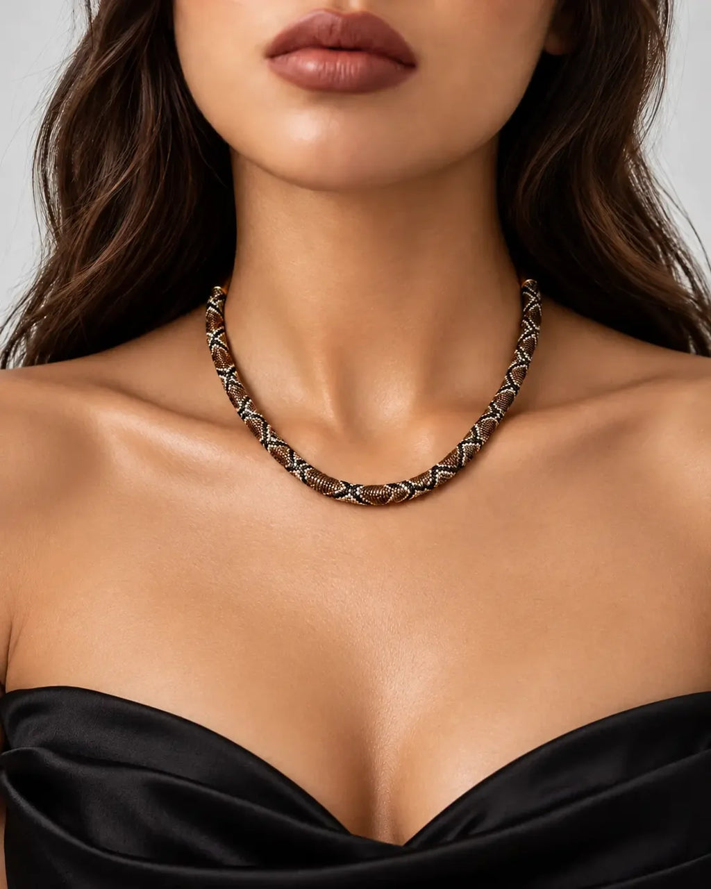 Serpent necklace neckline close-up
